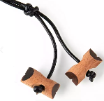 Wood beads, the sign for completing adult training.